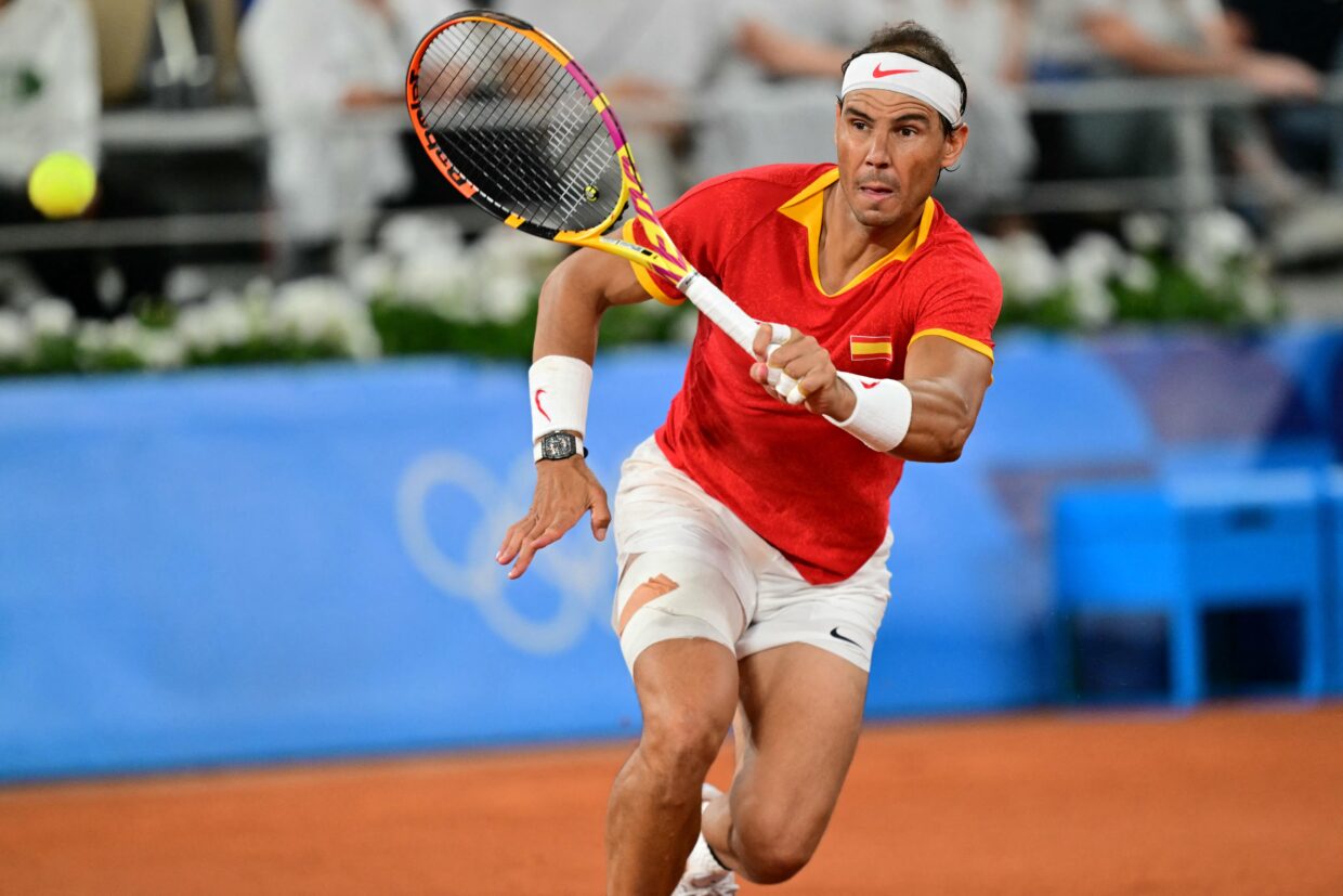 Rafael Nadal Bids Farewell to Singles Tennis in Emotional Davis Cup Loss Tennis legend Rafael Nadal played his final singles match on Wednesday, ending an illustrious career marked by remarkable achievements and unwavering dedication to the sport. The 22-time Grand Slam champion, competing in the Davis Cup for Spain, fell to Botic van de Zandschulp of the Netherlands in a 6-4, 6-4 defeat. The emotional farewell unfolded in front of Nadal's home crowd in Malaga, Spain. Despite the unspectacular ending, the match marked the culmination of a career that has inspired generations of tennis players and fans worldwide. Nadal, known as the "King of Clay" for his dominance on the surface, has battled injuries in recent years. His participation in the Davis Cup tie was uncertain, but captain David Ferrer called upon the veteran to lead Spain in the opening singles match. Despite the loss, Nadal expressed gratitude for the opportunity to represent his country one last time. "We went on court, we lived that moment, trying to do my best," he said, acknowledging van de Zandschulp's superior performance on the day. Nadal's emotions were evident throughout the match, particularly during the Spanish national anthem. "I was having an emotional day, nerves before what could be my last singles match as a professional," he admitted. While Nadal's singles career has come to an end, he remains committed to supporting his team in the Davis Cup. His dedication to representing Spain and his passion for the sport have left an indelible mark on tennis history. Tennis icon Roger Federer paid tribute to his former rival, acknowledging Nadal's contributions to the sport and his unwavering pride in representing Spain. Nadal's retirement marks the end of an era in tennis, but his legacy of sportsmanship, resilience, and extraordinary achievements will continue to inspire for generations to come.