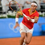 Rafael Nadal Bids Farewell to Singles Tennis in Emotional Davis Cup Loss Tennis legend Rafael Nadal played his final singles match on Wednesday, ending an illustrious career marked by remarkable achievements and unwavering dedication to the sport. The 22-time Grand Slam champion, competing in the Davis Cup for Spain, fell to Botic van de Zandschulp of the Netherlands in a 6-4, 6-4 defeat. The emotional farewell unfolded in front of Nadal's home crowd in Malaga, Spain. Despite the unspectacular ending, the match marked the culmination of a career that has inspired generations of tennis players and fans worldwide. Nadal, known as the "King of Clay" for his dominance on the surface, has battled injuries in recent years. His participation in the Davis Cup tie was uncertain, but captain David Ferrer called upon the veteran to lead Spain in the opening singles match. Despite the loss, Nadal expressed gratitude for the opportunity to represent his country one last time. "We went on court, we lived that moment, trying to do my best," he said, acknowledging van de Zandschulp's superior performance on the day. Nadal's emotions were evident throughout the match, particularly during the Spanish national anthem. "I was having an emotional day, nerves before what could be my last singles match as a professional," he admitted. While Nadal's singles career has come to an end, he remains committed to supporting his team in the Davis Cup. His dedication to representing Spain and his passion for the sport have left an indelible mark on tennis history. Tennis icon Roger Federer paid tribute to his former rival, acknowledging Nadal's contributions to the sport and his unwavering pride in representing Spain. Nadal's retirement marks the end of an era in tennis, but his legacy of sportsmanship, resilience, and extraordinary achievements will continue to inspire for generations to come.